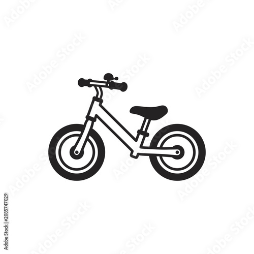 Black vector silhouette of a toddlers balance bike.