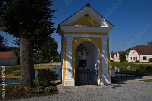 Chapel of Saint John of Nepomuk at the pond in village Lutova at Chlum u Trebone, South Bohemian Region, Czech Republic, Europe
