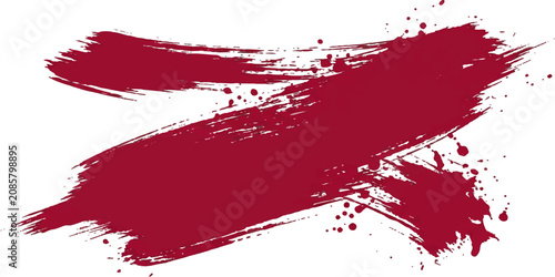 Red brush strokes with splatter effects during a dynamic artistic creation