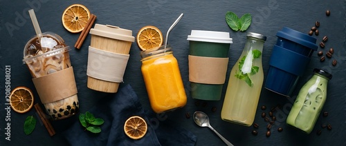 Variety of takeaway drinks in eco-friendly and reusable containers flat lay