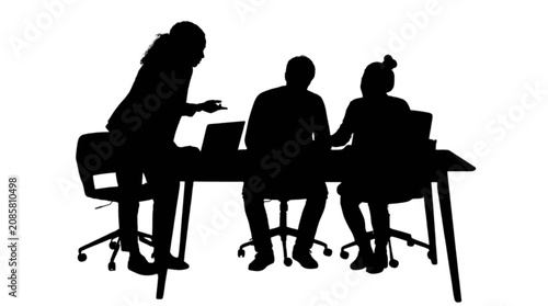 Silhouette of three business professionals collaborating at a table