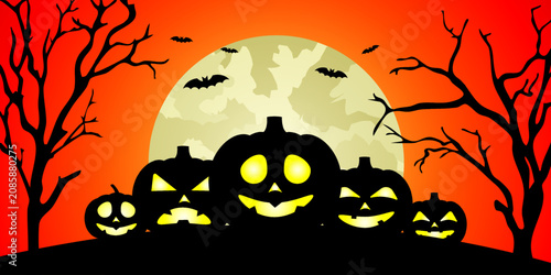 Фотография Silhouettes of Halloween in a spooky setting and menacing pumpkins