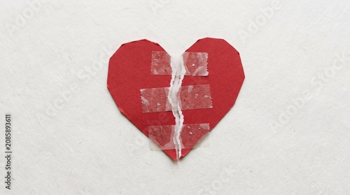 Torn Paper Heart Taped Back Together Symbolizing Forgiveness and Healing