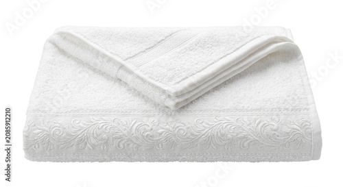 Bild auf Leinwand Luxurious white terry cloth towel with elegant embroidered border detail