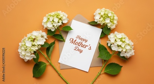 A beautiful mother's day greeting card surrounded by elegant white hydrangea flower blossoms