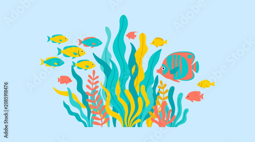 Tropical fish swimming through vibrant sea plants.