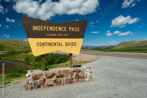 Independence Pass in the Colorado Rocky Mountains on Sunny Summer DayIndependence Pass Continental Divide Sign in Colorado on a Sunny Summer Day