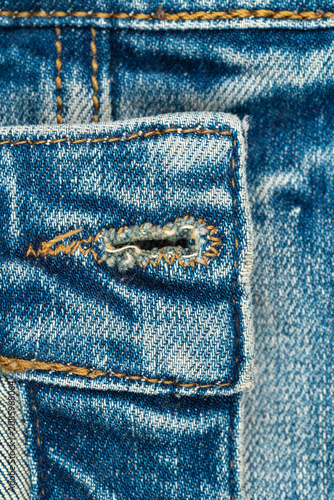 Quadro su tela Blue denim jeans texture with buttonhole and yellow stitching
