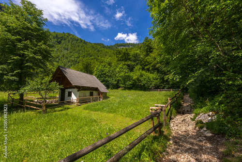 Hiking Through Mostnica Gorge to Slap Mostnice with Green Pastures and Traditional Farmhouses, Slovenia