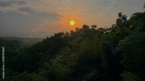 sunset in the mountains. Sunset Over Forested Hills at Golden Hour.