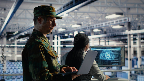 Konstfotografi Army commander uses AI tools in a server room to manage secure military computer systems