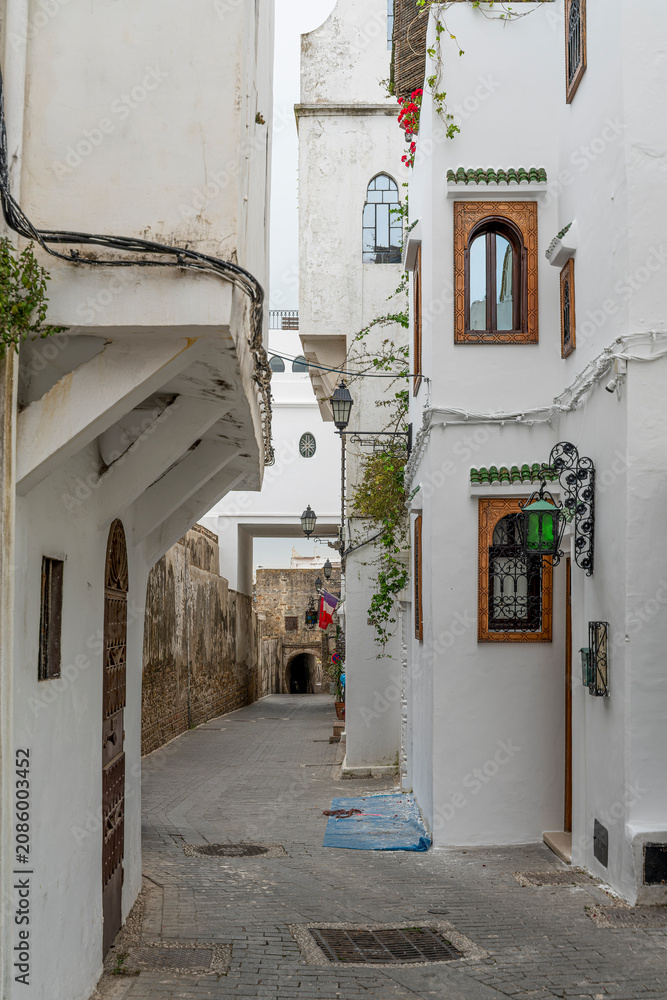 Fototapeta premium Morocco - Tangier - Kasbah - Whitewashed Alley with Overhanging Balcony