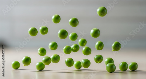 Floating garden peas in mid air fresh produce healthy eating and vibrant green color