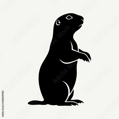 Black silhouette of a prairie dog standing upright