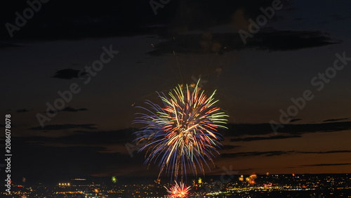 Fireworks over the Rio Grande Valley for the 250th birthday of the USA near Albuquerque New Mexico at sunset