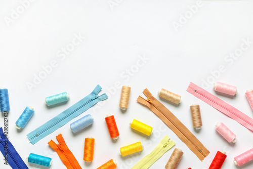 Colorful thread spools with...