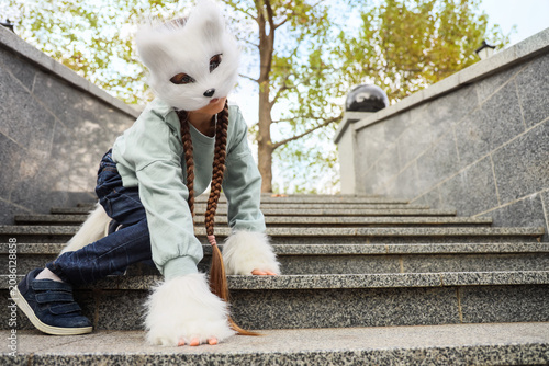Quadrober girl in cat mask ...