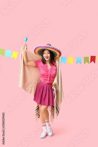 Happy young woman in Mexica...