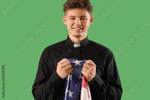 Male priest with USA flag o...