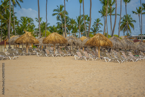 Obraz na płótnie beach chair loungers on tropical beach