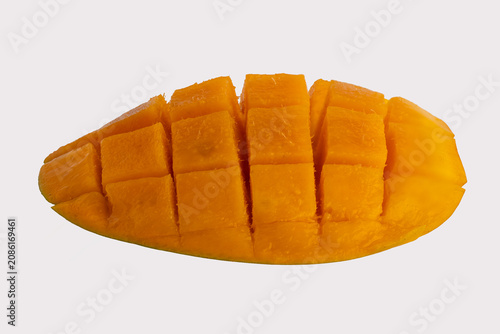 Fresh Ripe Yellow Mango Cut Hedgehog Style Isolated on White Background