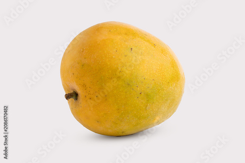 Single Fresh Ripe Sweet Yellow Mango Fruit Isolated on White Background