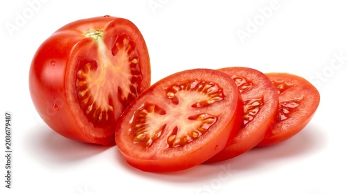 Fresh red tomato cut in half and sliced on a white background.