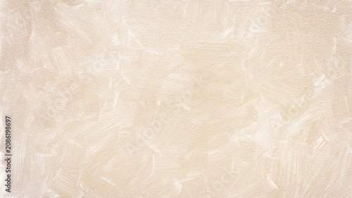 фотографія Light beige stucco wall texture, visible brush strokes, soft grunge abstract background