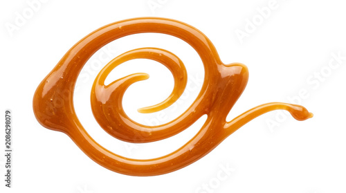 Quadro su tela Swirl of sweet liquid caramel sauce isolated on transparent background high quality food graphic design element