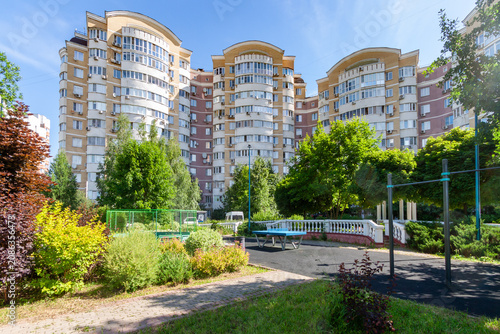 Biophilic Design Luxury Residential Courtyard with Landscaped Garden and Modern Apartment Buildings