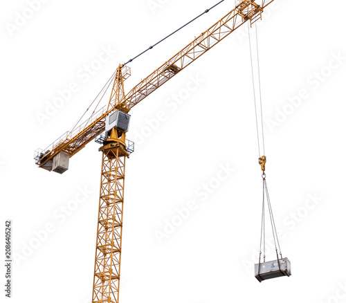 Foto Construction crane lifting cargo isolated on withe background