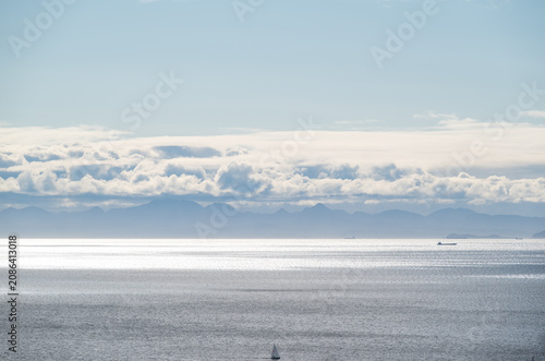 Panoramic view of the sparkling Seto Inland Sea under a cloudy sky