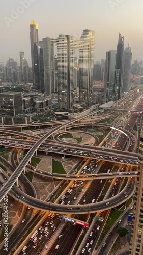 Highway traffic interchange in Dubai.  Dubai, United Arab Emirates aerial footage. Beautiful view of the Duabi skyline and infrastructure.