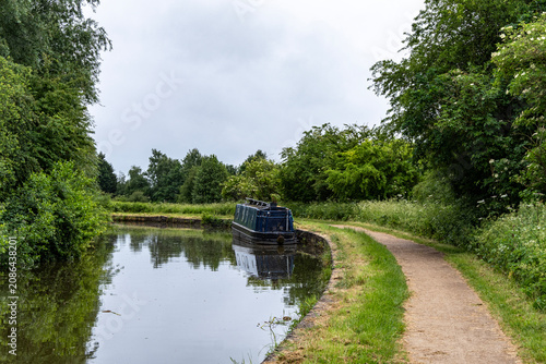Moored narrow boat in the countryside