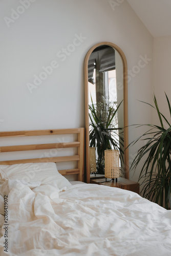 Interior Design Of Sunlit Attic Bedroom Through Open Door