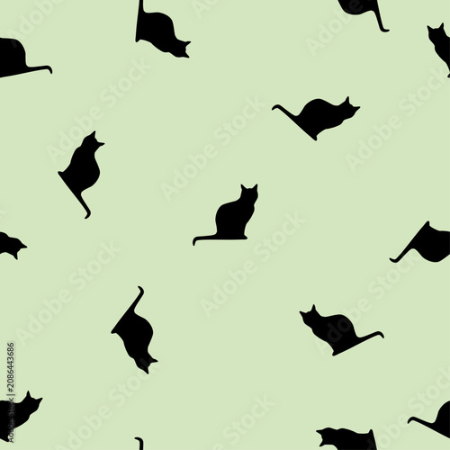 Seamless animals pattern black cats on green background, vector eps 10