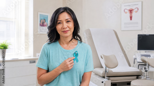 Woman Holding Teal Ribbon for Cervical Cancer Awareness