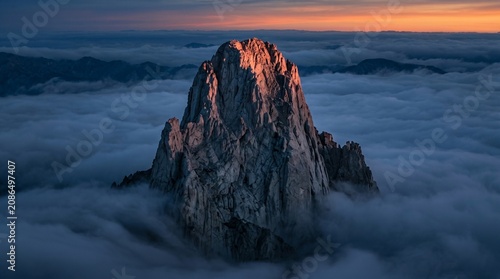 Mountain Peak Above Clouds.