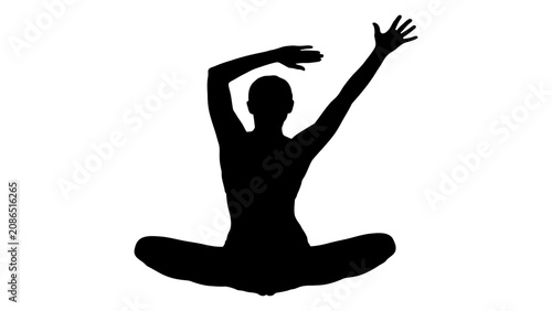 Canvas-taulu Yoga practitioner sits in a meditative lotus pose while maintaining a balanced and centered body alignment