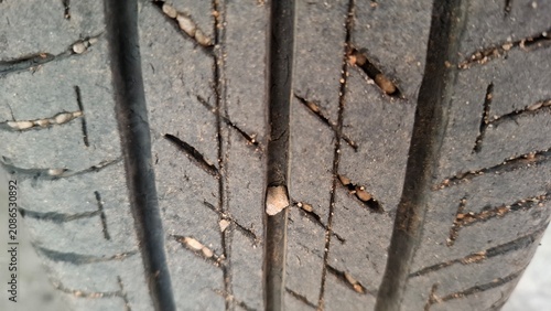 Close up of worn car tire tread texture