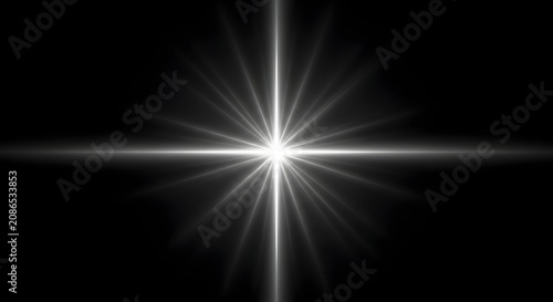 Bright white lens flare starburst effect isolated on black background for cinematic lighting design