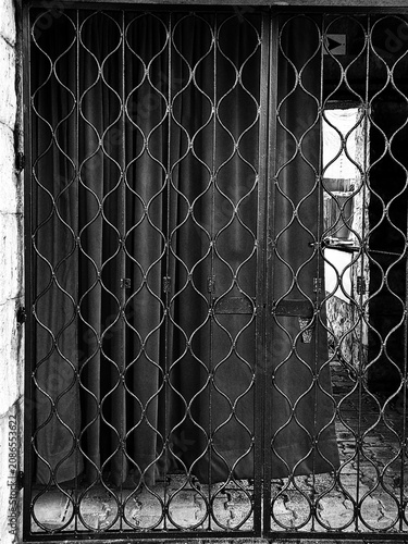 Photography Black and White Window Behind Metal Security Gate