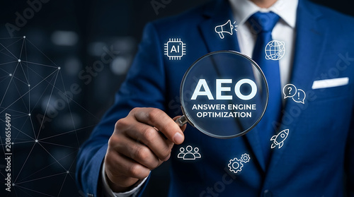 Businessman holding magnifying glass focusing on AEO Answer Engine Optimization