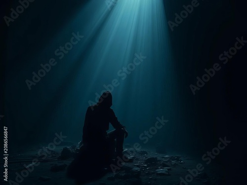 A solitary figure sits amidst darkness, weighed down by oppressive shadows, hopelessness, oppression