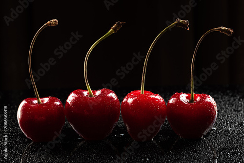 cherries on a black