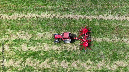 Εκτύπωση καμβά Red tractor performing tillage on harvested field with detailed soil and crop re