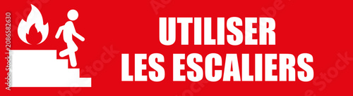 Panneau de Sécurité Utiliser les Escaliers avec Icône Flamme et Personne sur Fond Rouge