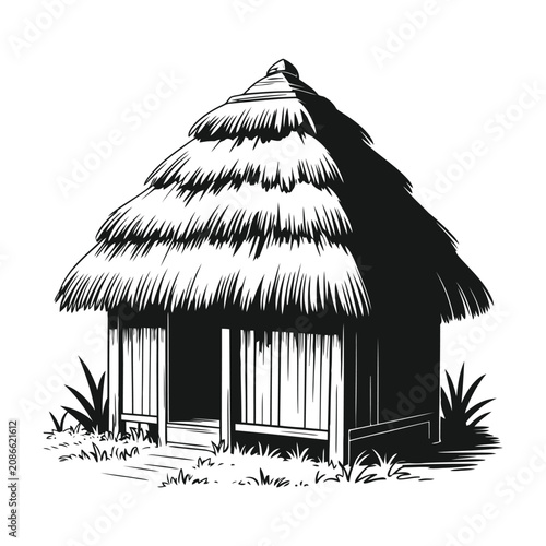 Thatched roof hut silhouette in black and white standing on grass.