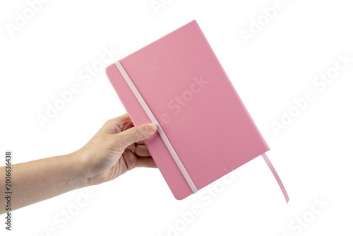 A pink notebook, a note-taking notebook in hand, against a transparent background. 