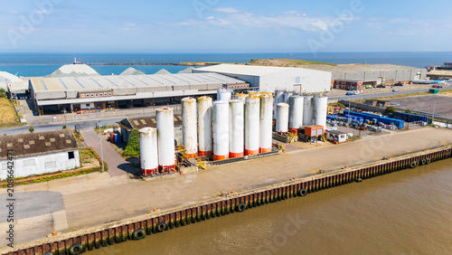 Aerial view of a group of chemical storage tanks on the River Yare in Great Yarmouth, North Norfolk, UK